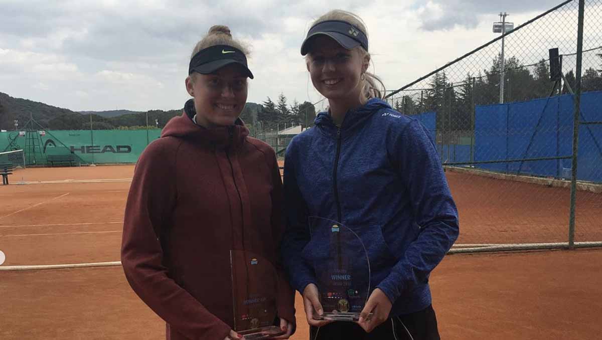 Clara Tauson with her doubles partner Hannah Moller in April 2018